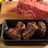 American Wagyu Cote Steak · Our signature cut, the chuck flap tail, and is a buttery bite that is perfectly marbled. Tru...