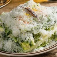 Speedy Romeo Caesar · Romaine hearts, house dressing, shaved parmesan, anchovy and lemon zest.