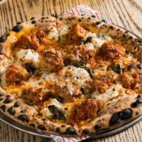 The Dangerfield · Béchamel, pork and veal meatballs, ricotta, provel, and toasted garlic chips.