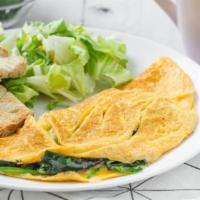 Healthy Green Omelet · Tasty Omelet, made with 3 farm fresh eggs, and topped with Spinach, broccoli, green onions, ...