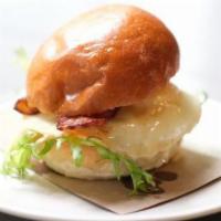 Egg Sandwich · Fried egg and aged cheddar. Option to add on Bacon or Avocado