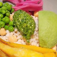Couscous Bowl · Roasted baby carrots. green peas, avocado,pickled red onions, vegan basil pesto, served over...