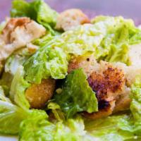 Caesar Salad · Romaine Lettuce topped with croutons & our famous creamy caesar dressing