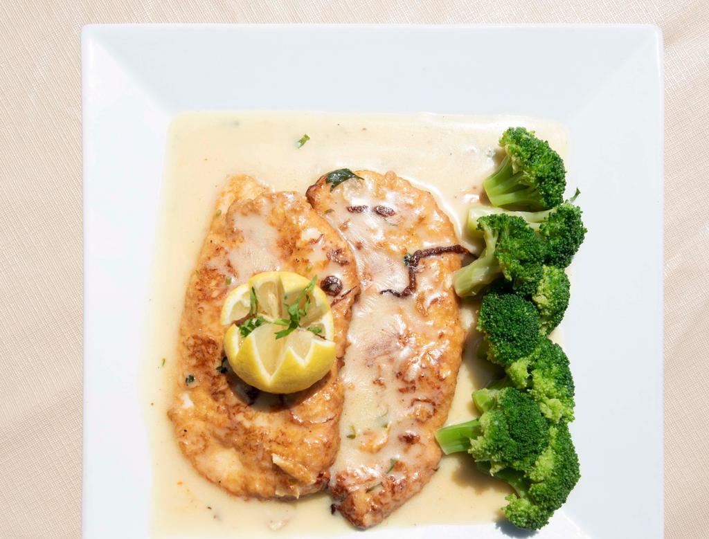 Chicken Francese · Battered breast of chicken sautéed in lemon, butter, and white wine.