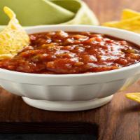 Chips & Salsa · Crispy warm corn tortilla chips with a side of house-made savory salsa.