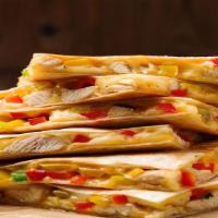 Vegetable Quesadilla · Sauteed peppers, onions, and warm creamy Mozzarella cheese folded between a flour tortilla a...