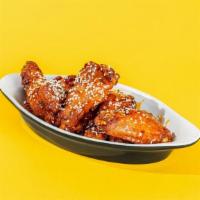 Chicken Wings · maple hot sauce or chipotle bbq sauce, sesame seeds (7pc or 14pcs)