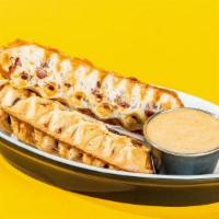 The Waffle Dog · waffle battered wagyu hot dog on a stick, spicy maple mayo dipping sauce (1pc or 4pcs)
