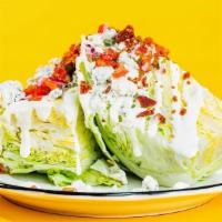 The Wedge Salad · Iceberg lettuce, blue cheese crumble, tomato-jalapeno salsa, blue cheese sauce, applewood sm...