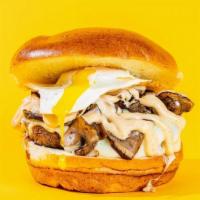 Louis Xiii Burger · mozzarella, sautéed cremini mushrooms, truffle oil, sunny-side up egg, roasted garlic mayo