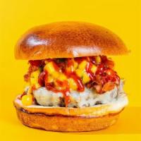 The Empress Burger · cheddar, applewood smoked bacon, spicy ketchup, mango relish