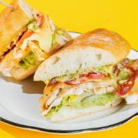The Clubhouse · avocado mash, chicken breast, cheddar cheese, tomatoes, romaine lettuce, applewood smoked ba...