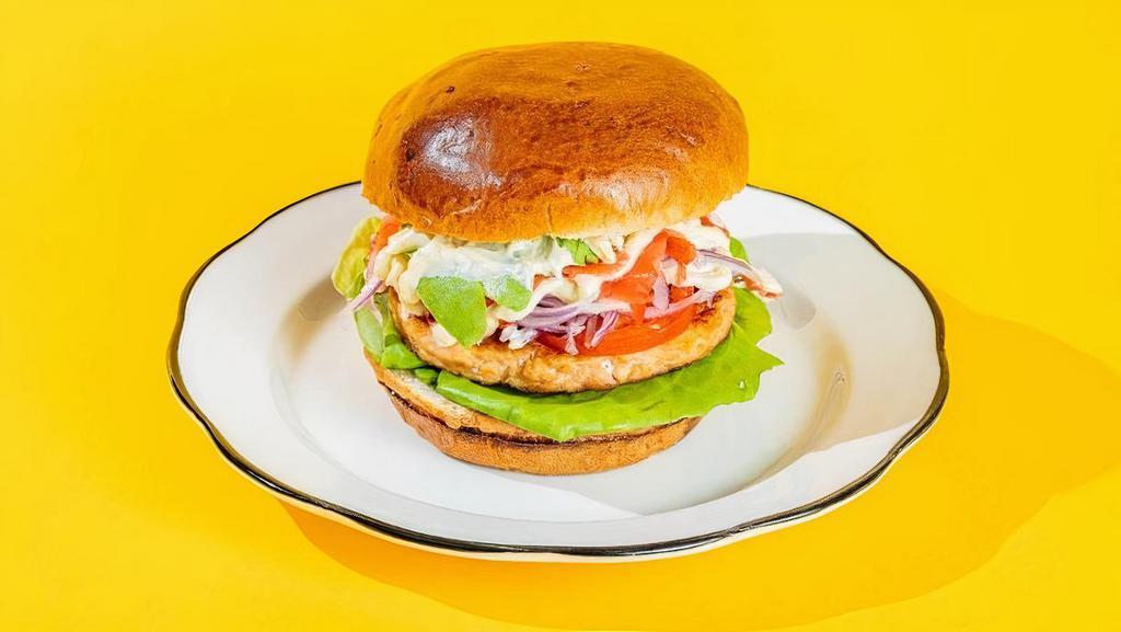 Go  Fish Burger · alaskan salmon burger, red onions, avocado, tomatoes, lettuce, pickled ginger, citrus mayo, brioche bun