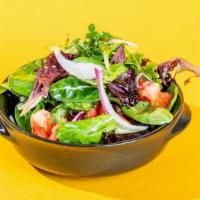 Small Mixed Greens Salad · mixed greens, red onions, tomatoes, champagne vinaigrette