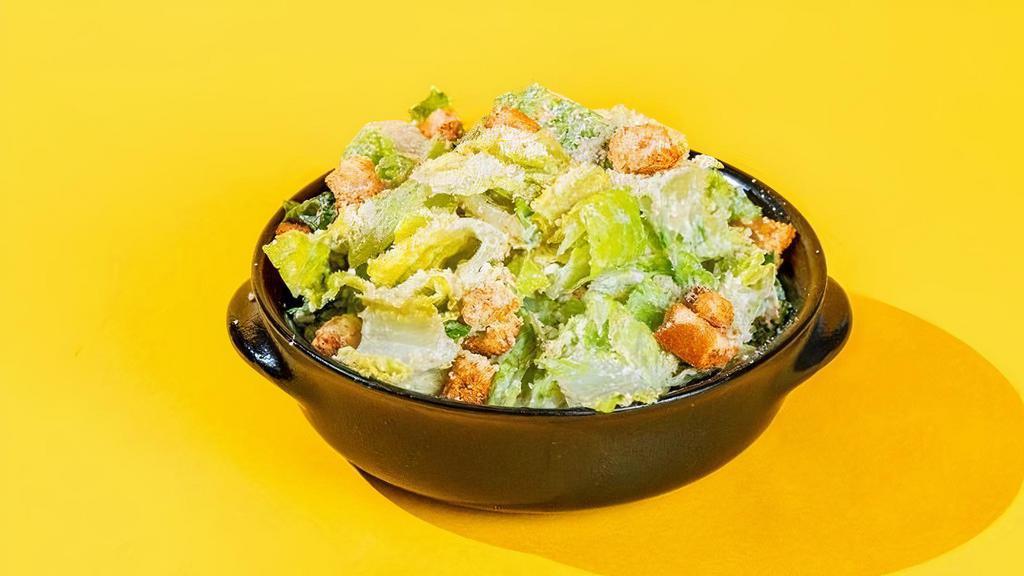 Small Caesar Salad · lettuce, house caesar dressing, shaved parmesan, spicy brioche croutons