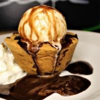 Molten Chocolate Cookie · warm molten lava chocolate chip cookie with a scoop of vanilla ice cream on the side