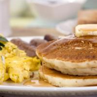 Sausage Pancakes · Fluffy, buttery, light, buttermilk pancakes and savory breakfast sausage. Served with real b...