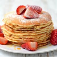 Strawberry Pancakes · Fluffy, golden, buttery buttermilk pancakes loaded with fresh strawberries. Served with real...