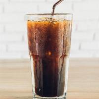 Iced Coffee · Freshly brewed, house blend coffee over ice.