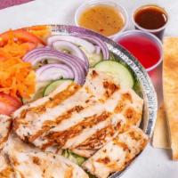Grilled Chicken Over Tossed Salad
 · Served with pita bread and dressing.