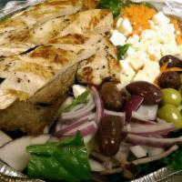 Grilled Chicken Over Greek Salad
 · Served with pita bread and dressing.