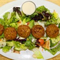 Falafel Over Tossed Salad · Served with pita bread and dressing.