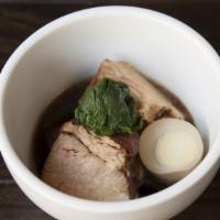 Butakaku Appetizer · Braised pork belly simmered in a soy based sauce.