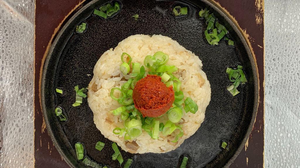Spicy Fried Rice · Above fried rice with a spicy bomb on top.