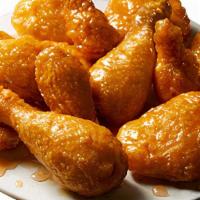 Honey Garlic Wings · Brushed with a sweet, soy-based sauce, these are light on heat and heavy on flavor.