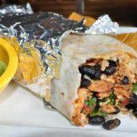 Burrito · Flour tortilla, rice, black beans, pico di gallo, cheese, Mexican crema, salsa choice.