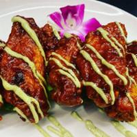 Sweet Chili Wings · Crispy wings in our signature sweet chili sauce