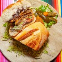 Torta De Milanesa (Beef Or Chicken) · Breaded rib-eye steak or boneless chicken breast, sauteed with olive oil, served with fried ...