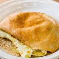 Egg Sandwich · Four baked egg whites served in a whole wheat pita or multi-grain bread.