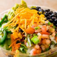 Mexican Salad · Chopped romaine, pica de gallo, black beans, guacamole, jalapenos and shredded cheese.