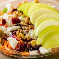 Power Apple · Mesclun salad with apples, raisins, walnuts and goat cheese.