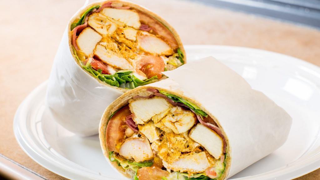 Blt Wrap · Grilled chicken, lean turkey bacon, lettuce, tomato, low-fat mozzarella and low fat mayo.