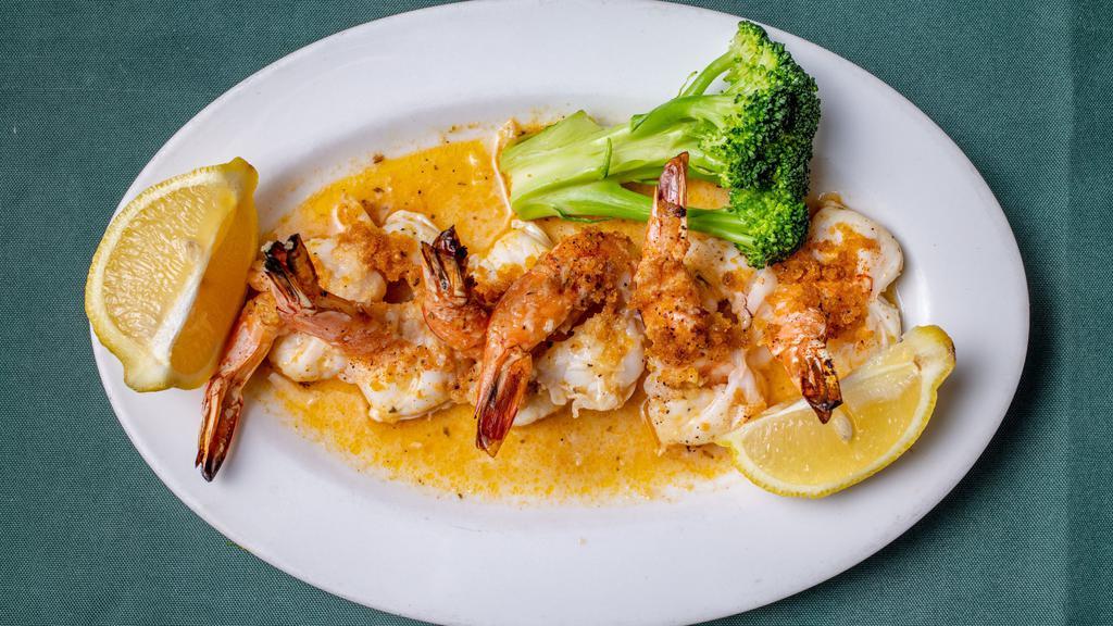 Scampi · Scampi sauce: broiled with garlic olive oil an butter. served with choice of side.