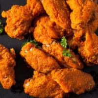 Buffalo Wings · Served with Bleu Cheese.