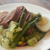 Tuna Nicoise · Served with potatoes, cherry tomatoes, asparagus and soft-boiled egg.
