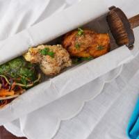Kabab Trio · A tasting trio of Hariyali Kabab, Malai Kabab & Chicken Tikka.