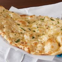 Garlic Naan · Bread made of white flour topped with fresh minced garlic.