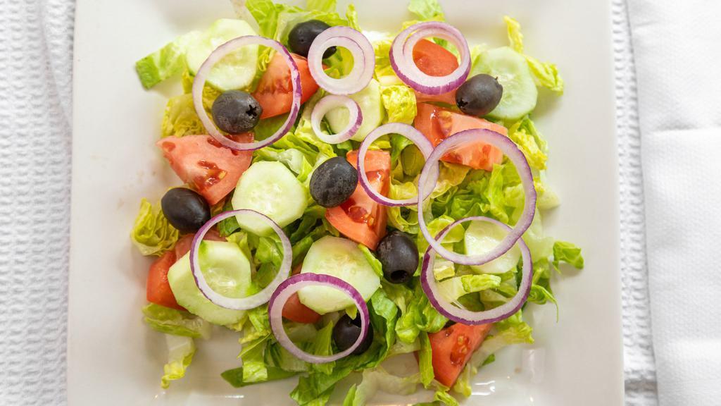 House Salad · Crisp mix of iceberg and romaine lettuce, onions, tomatoes, cucumbers and sliced black olives.