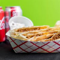 G Beef Quesadilla · Ground beef cooked with our signature 