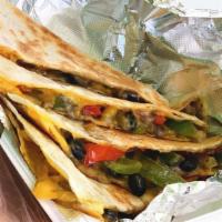 Sweet Pepper Quesadilla · A variety of fresh sliced peppers sautéed then melted together with Mexi-cheese and pressed ...