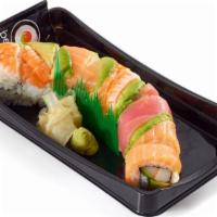 Rainbow Roll · 270 calories. Classic California roll wrapped with variety of seafood.