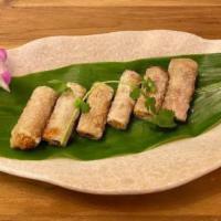 Crispy Imperial Roll · Three Deep Fried Rice Paper Rolls Stuffed with Minced Pork and Vegetables. Served with a Sid...