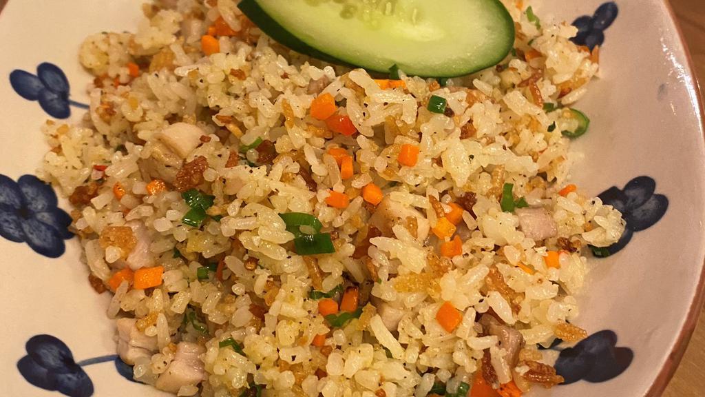 Krazy Fried Rice  · Wok Tossed Jasmine Rice with Chopped Pork Belly and Mixed Vegetables (Carrot, Onion, Red Pepper. Garlic Chips and Crunchy Rice)