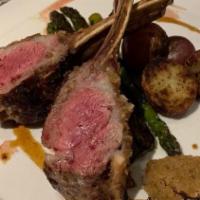 Herb Crusted Colorado Rack Of Lamb · Gluten-free. Served With Roasted Potatoes & Vegetables.