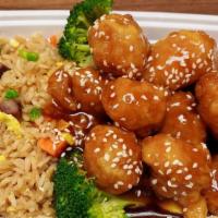 Sesame Chicken · White meat chicken lightly battered fried to golden brown then sauteed with authentic fragra...