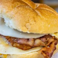 The Metro · Egg, bacon, cheese, hash brown on a roll.